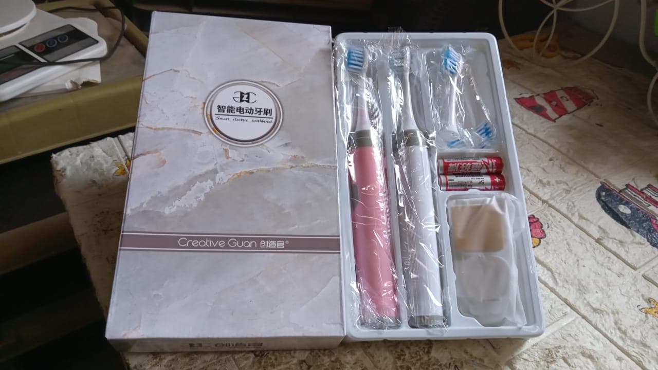 Adult Waterproof Electric Toothbrush Strong Sonic Charging with 4 Toothbrush Head and a toothbrush holder thumbnail 8