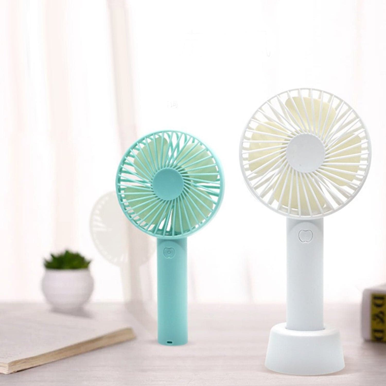 Portable Handheld Fan used in summers in all kinds of places including household and offices etc.(Battery Not Include) thumbnail 7